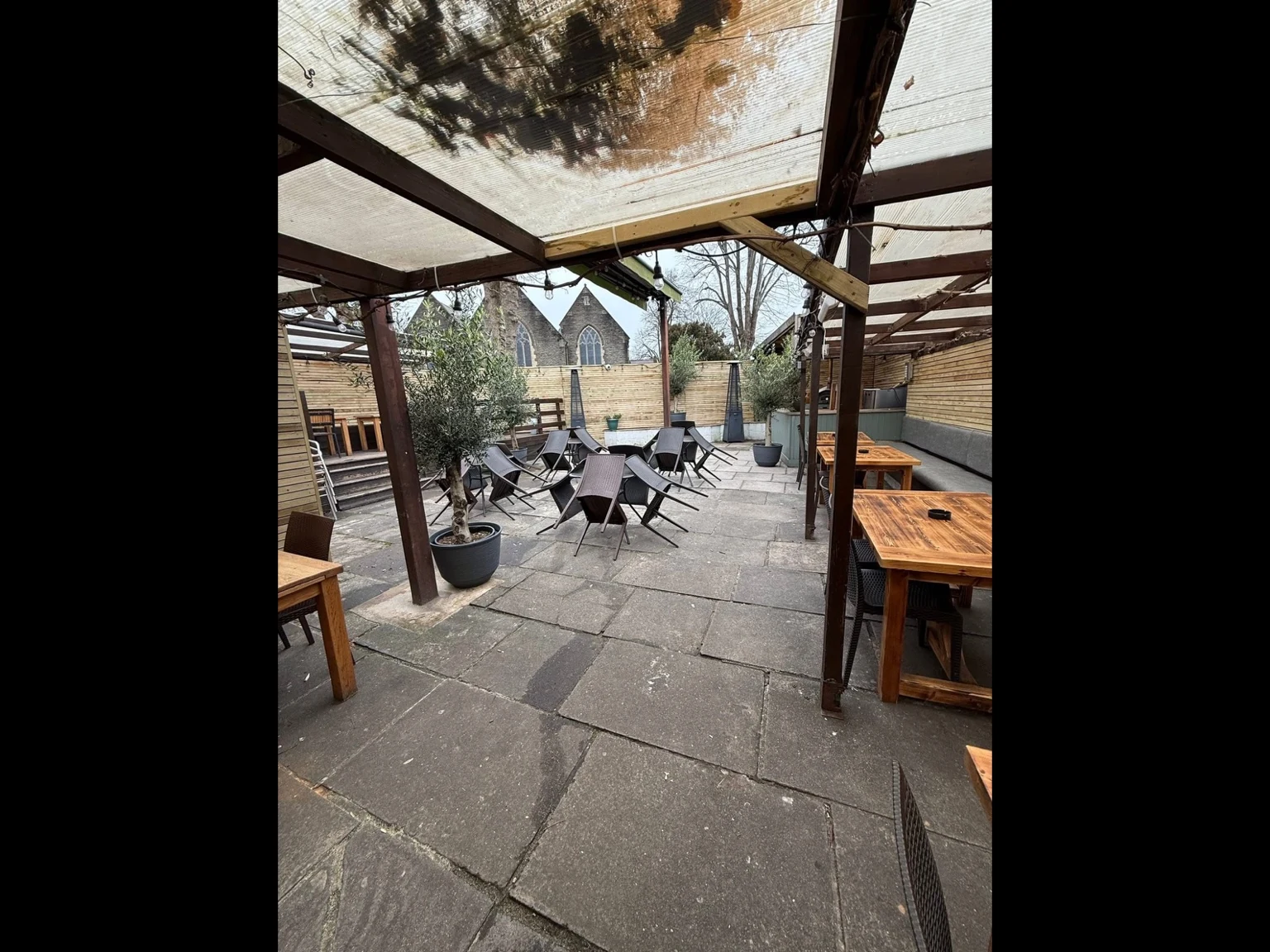 Covered seating looking into the Robin Hood garden